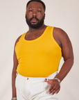 Elijah is wearing Tank Top in Sunshine Yellow