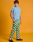 Side view of Checkerboard Work Pants in White/Green and baby blue Organic Vintage Tee on Quinn