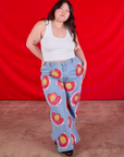 Wide Leg Denim Trousers in Painted Flowers and Cropped Tank in Vintage Tee Off-White worn by Ashley