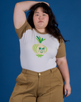 Ashley is wearing Produce Raglan Tee in Onion