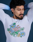 Front close up of Floral Long Sleeve Baby Tee in Baby Blue on Jesse