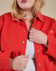 Front close up of Denim Work Jacket in Mustang Red on Juliet