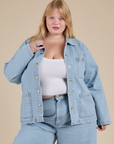 Juliet is 5'8" and wearing L Indigo Denim Work Jacket in Light Wash