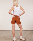 Back view of Classic Work Shorts in Burnt Terracotta and Cropped Tank Top in vintage tee off-white on Madeline