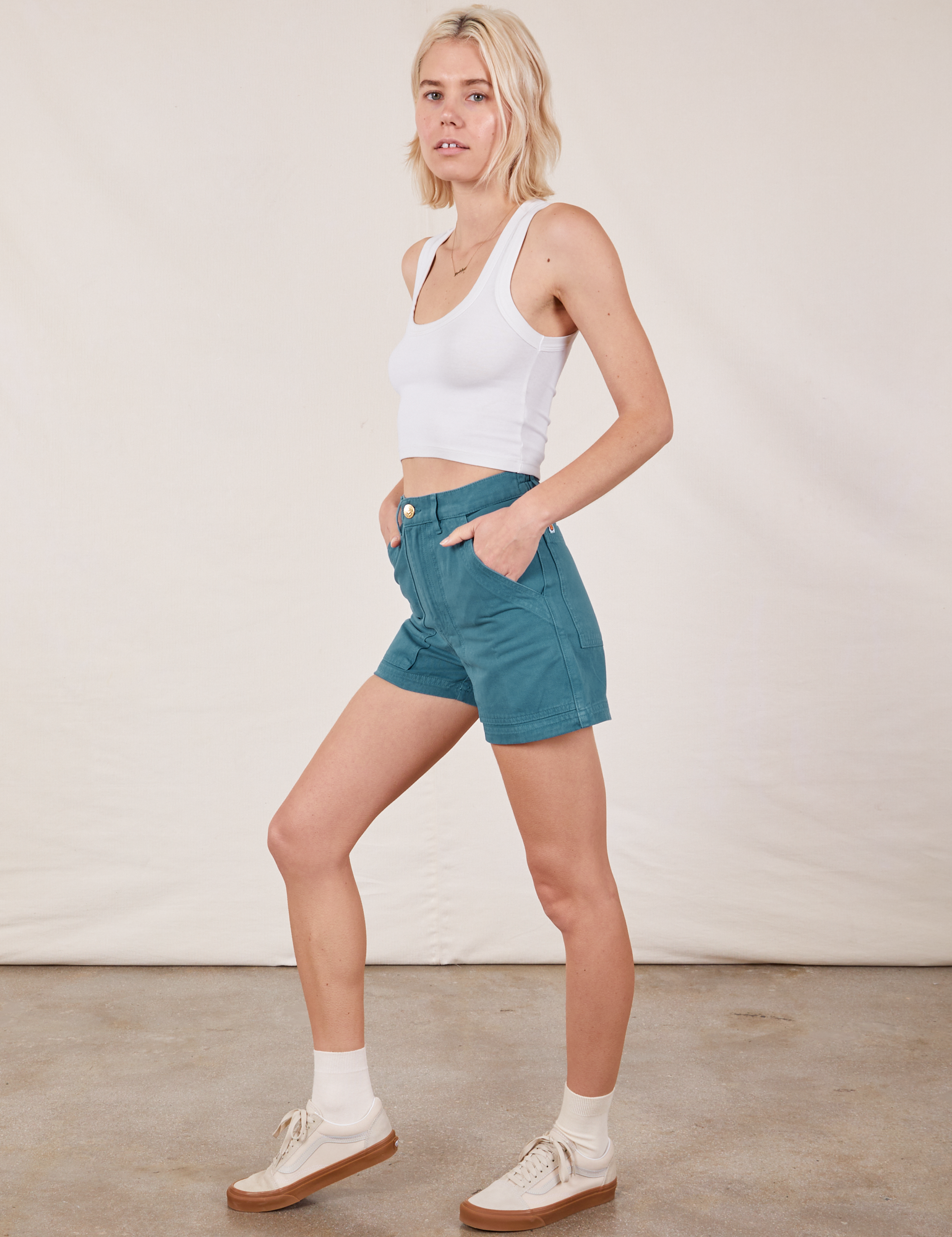 Side view of Classic Work Shorts in Marine Blue and Cropped Tank Top in vintage tee off-white