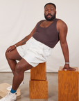 Elijah is wearing Classic Work Shorts in Vintage Tee Off-White and espresso brown Tank Top