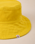 Wide Brim Denim Bucket Hats in Golden Yellow close up