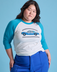 Ashley is 5'7" and wearing L Taxi Raglan Tee in San Francisco