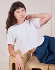 Alex is wearing Cropped Burly Tee in Vintage Tee White