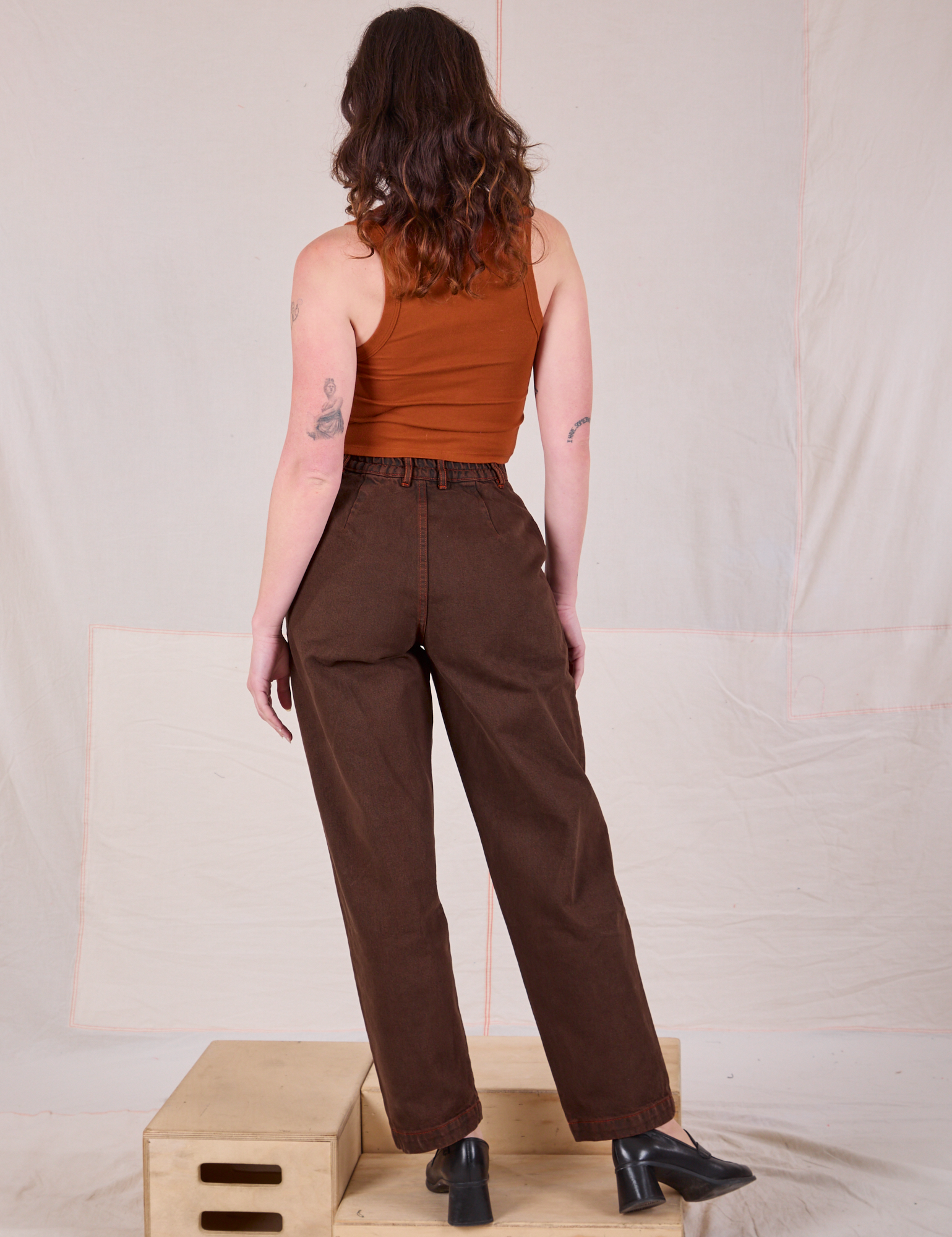 Back view of Overdyed Denim Trouser in Fudge and Cropped Tank in Burnt Terracotta