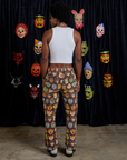 Back view of Work Pants in Halloween Masks and Cropped Tank in Vintage Tee White