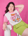 Ashley is wearing Anniversary Tee in Pink Poppy