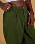 Baggy Mid-Rise Trousers in Evergreen side view close up on Jerrod
