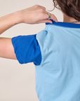 Mismatched Tee in Baby & Royal Blue back shoulder close up on Alex
