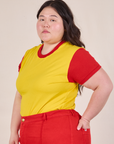 Angled front view of Mismatched Tee in Yellow & Red on Ashley