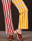 Western Pants in Ketchup/Mustard Stripes pant leg close up on Alex