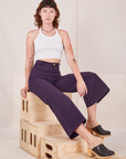 Alex is wearing Bell Bottoms in Nebula Purple and Halter Top in vintage tee off-white