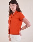 Pantry Button-Up in Chili Red side view on Alex
