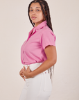 Side view of Pantry Button-Up in Bubblegum Pink worn by Gabi