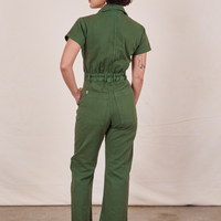 Petite Short Sleeve Jumpsuit in Dark Emerald Green back view on Soraya