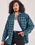 Jesse is 5'8" and wearing XS Plaid Flannel Overshirt in Marine Blue