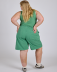 Longline Work Shorts in Seafoam Green back view on Juliet