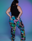 Back view of Work Pants in Rainbow Magic Waters and black Cropped Tank on Ashley