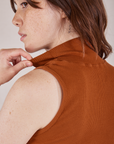 Back shoulder close up of Sleeveless Essential Turtleneck in Burnt Terracotta on Hana