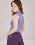 Angled back view of Sleeveless Essential Turtleneck in Faded Grape on Hana