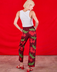 Back view of Paintstamped Work Pants in Cherry and Cropped Tank in vintage tee off-white on Madeline