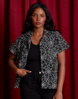 Kandia is 5'3" and wearing XXS Spider Webs Pantry Button-Up