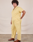 Short Sleeve Jumpsuit in Butter Yellow side view on Miguel