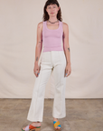 Alex is wearing Tank Top in Lilac and vintage tee off-white Western Pants