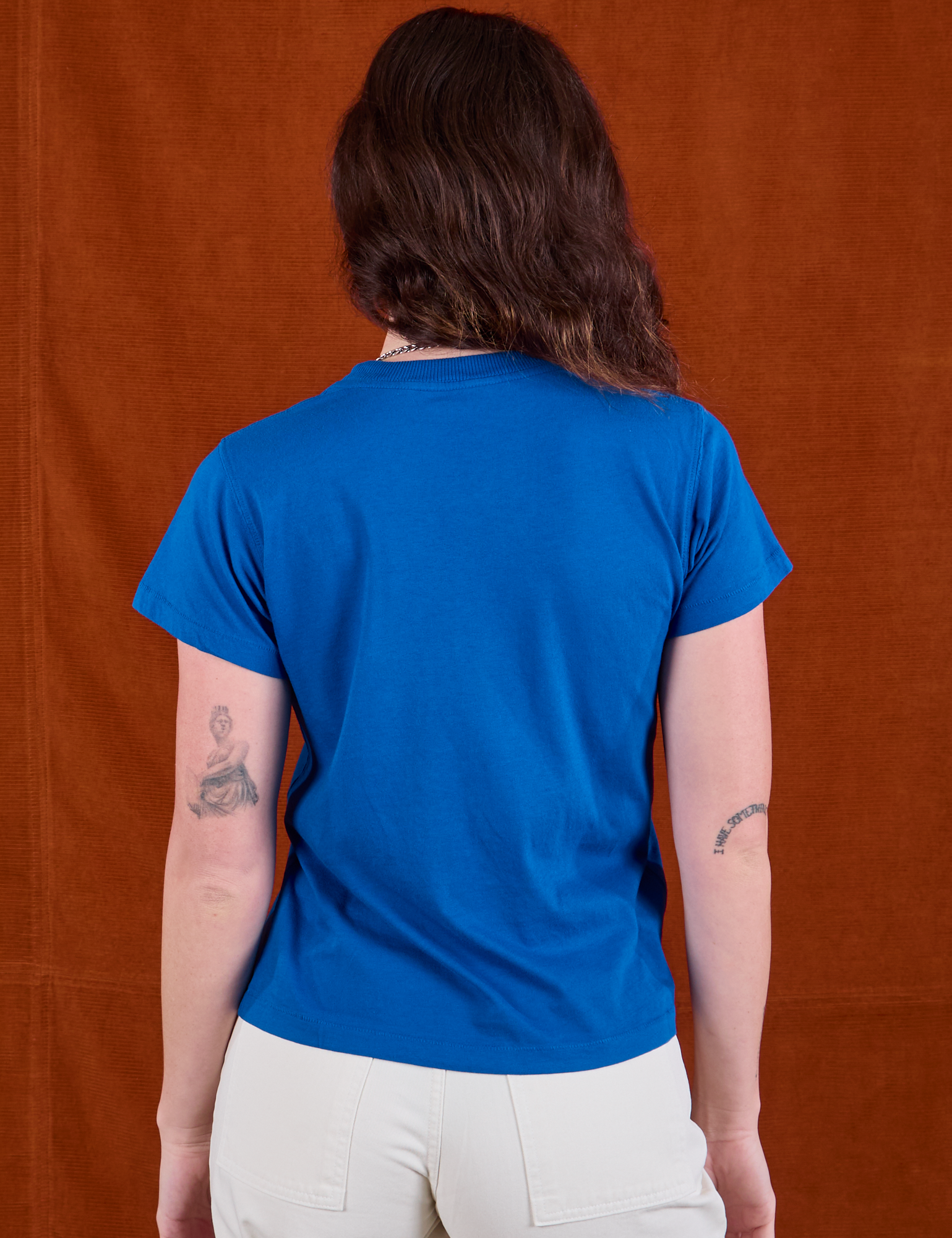 Sunny Los Angeles Tourist Tee back view on Alex