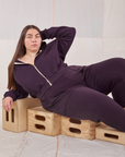 Marielena is wearing Rolled Cuff Sweat Pants in Nebula Purple and matching Cropped Zip Hoodie
