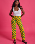 Kandia is wearing Checkerboard Work Pants in Green/Yellow and Cropped Tank in Vintage Tee White