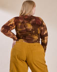 Long Sleeve Baby Tee in Honey Brown back view on Juliet