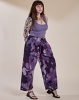 Angled front view of Magic Waters Drop Pocket Pants in Dark Lavender and faded grape Cropped Tank on Sydney