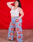 Side view of Wide Leg Denim Trousers in Painted Flowers on Ashley