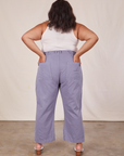 Back view of Western Pants in Faded Grape and Tank Top in vintage tee off-white worn by Alicia