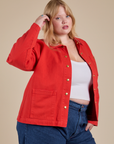 Angled front view of Denim Work Jacket in Mustang Red on Juliet