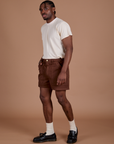 Angled front view of Classic Work Shorts in Fudgesicle Brown and Organic Vintage Tee in Vintage Off White