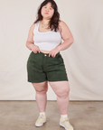 Ashley is wearing Classic Work Shorts in Swamp Green and Cropped Tank Top in vintage tee off-white