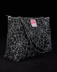 Angled view of Spider Webs Printed XL Zip Tote