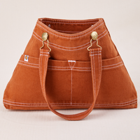 Overall Handbag in Burnt Terracotta with handle strap down across front