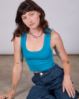 Alex is wearing Cropped Tank Top in Hawaiian Blue