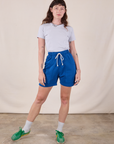 Alex is 5'8" and wearing XXS Sweat Shorts in Royal Blue