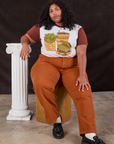 Morgan is wearing Anniversary Tee in Fast Food and burnt terracotta Work Pants