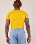 Baby Tee in Golden Yellow back view on Isaac
