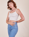 Angled view of Cropped Cami in Vintage Tee Off-White and light wash Frontier Jeans worn by Alex
